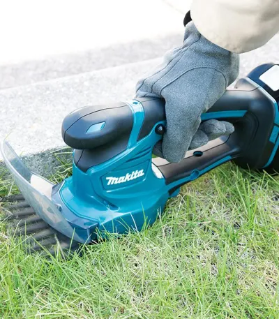Makita Akumulatorske škare za travu DUM111SYX SET baterija 1.5 Ah + punjač