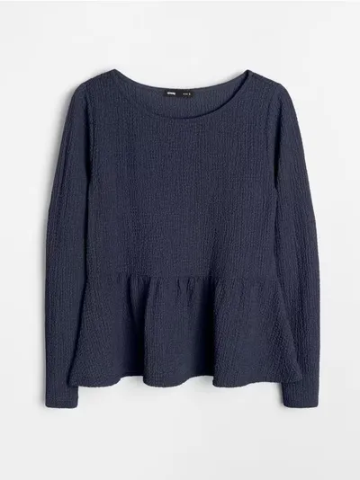 Bluza s ukrasnim volanima