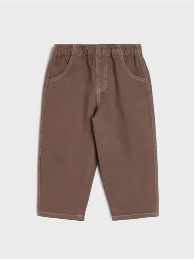 Teksas pantalone s kontrastnim koncem