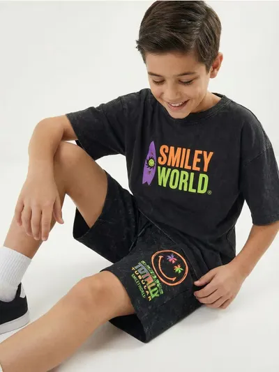 Šorts za trening sa efektom ispranosti SmileyWorld®