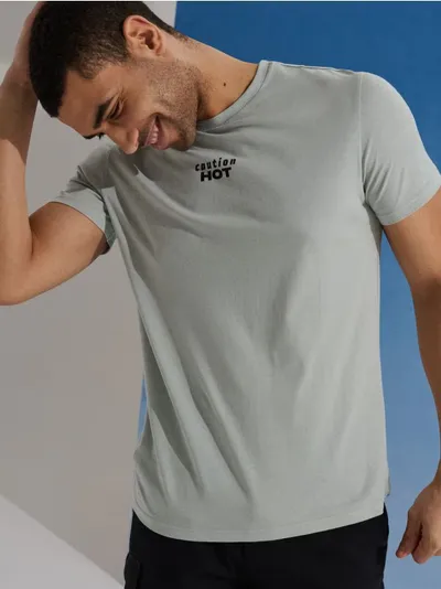 Pamučna majica s natpisom Caution Hot