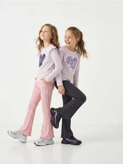 Rebraste flare pantalone 2 pakovanja