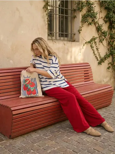 Široke pantalone s dekorativnim vezicama sa strane